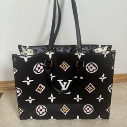 Louis Vuitton “On the go”Purse 