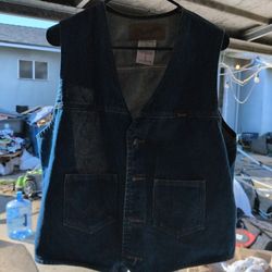 vintage Wrangler denim vest, commonly identified as a Cowboy Cut western-style vest.