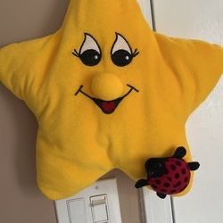 Yellow Star Shaped Plush Toy With Ladybug Attached , $10