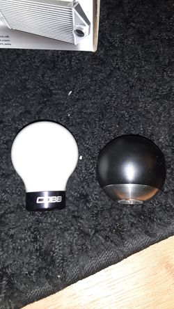 One Cobb shift knob and one weighted shift knob .Will not ship