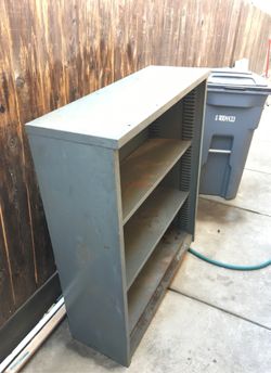 The metal cabinet. Long 36”1/2. Width 12”1/2, height 42”1/2