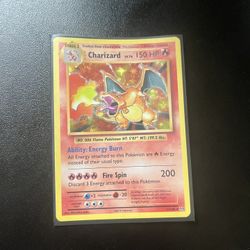 Charzard Holo card from XY Evolutions 