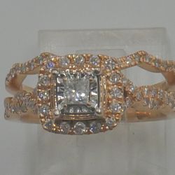 14KT ROSE GOLD ENGAGEMENT RING SIZE 7; 5.9 GRAMS ; W  0.62 PTS OF DIAMONDS MINT CONDITION. 871326-1.