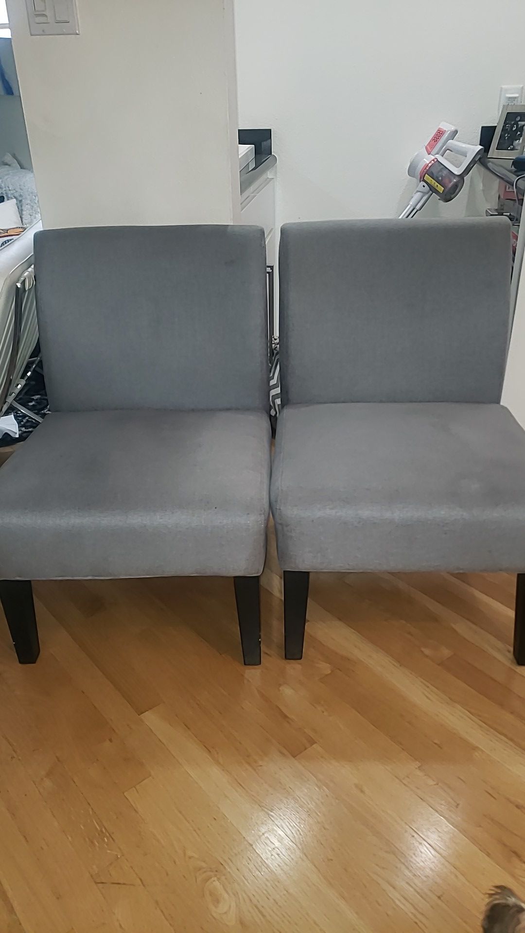 2 gray fabric chairs