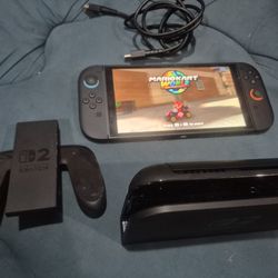 Switch 2 (Brand New No Box) has dock, joycon grip, hdmi, 512 micro sd, power cable