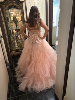 Sweet 16  or quinceañera dress pink really nice never use. My daughter loose lot of weight   Size is 12
