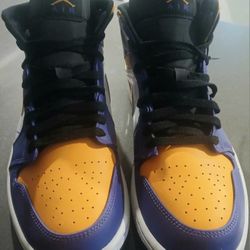 Air Jordan 1 Mid in the "Lakers" colorway,