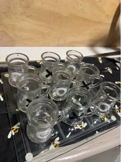 Glass tic-tac-toe drinking game