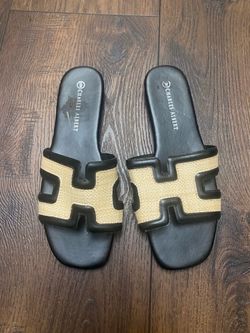 Women’s black and khaki sandals size 9 by Charles Albert