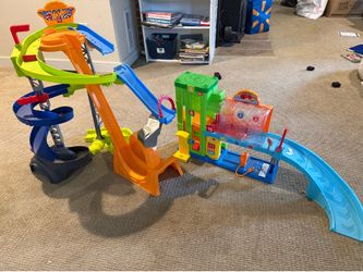 Hot Wheels Track, Little People Carwash, and Fisher Price Garage