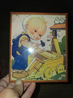 Vintage wall plaque. Drawn by Beatrice Mallot an signed by her as well.