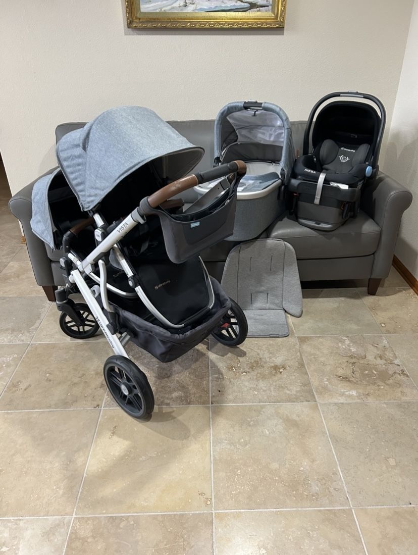 Uppababy Vista V2 Double Stroller with car seat and bassinet light blue