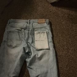 Blue rip purple jeans