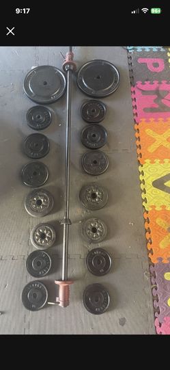 Weight Plates / Bar. 70 Dollars
