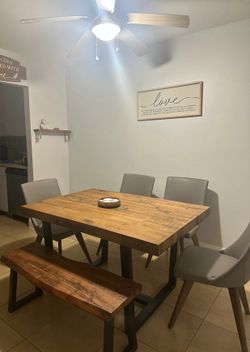 Dining room table with bench and chairs
