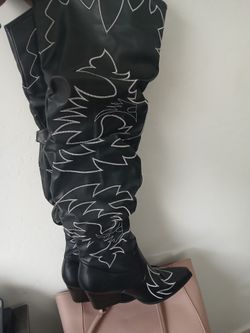 Thigh high fashion boots