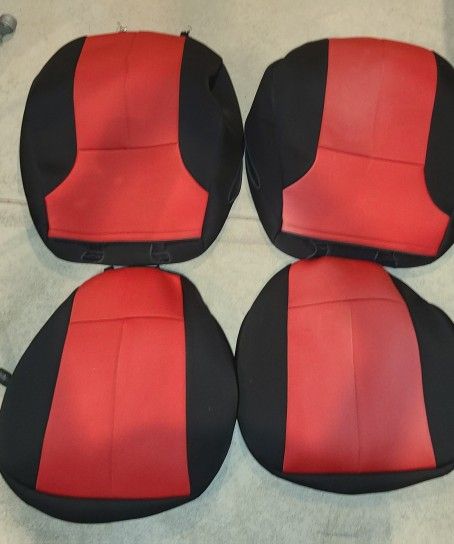 Prius front seat covers, K&N air filter, wiper blade replacements, and steering wheel cover
