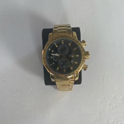 Gold Chronograph Watch with Black Dial