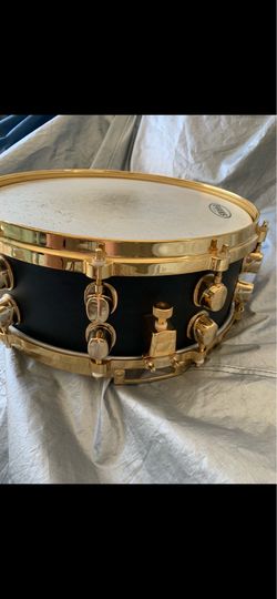 Professional drum set including: Double bass Drum Pedal By Duallist. Also custom drum set and Roto toms. And Zildjian cymbals and Rack