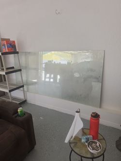 Very big mirror very thick very heavy it is dirty but it would clean up well