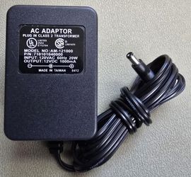 AC Adapter Adaptor Model No: AM-121000 P/N: (contact info removed)40000 Output: 12VDC 1000mA/1A