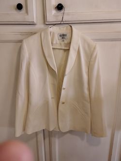 Women's white pant suit.