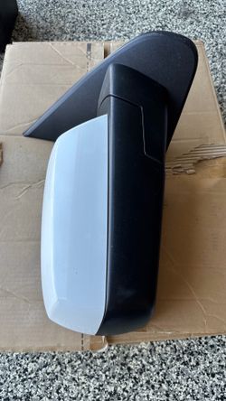 Passenger side mirror for 2016 through 2019 Chevy Silverado 1500 LT in white