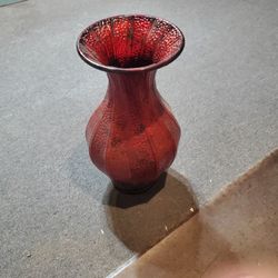 Red tin plant holder