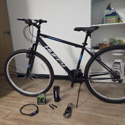 Black and Blue Huffy Bike