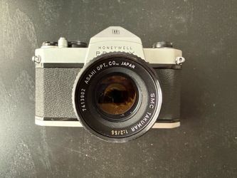 Used camera bundle - Pentax Spotmatic SLR, Tokina zoom lenses, Targus tripod, Opteka filters- AS IS