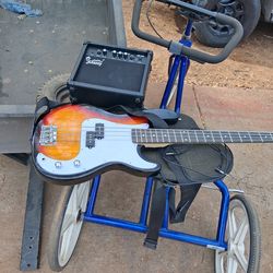 GLarry bass guitar with amp