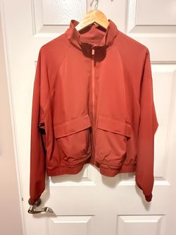Never-worn Old Navy Active StretchTech jacket in a beautiful rust orange shade. Women’s size Large.