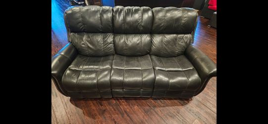 Luxury living room set. End recliners, plug in adapters for charging. Seat is rocker and recliner. Leather