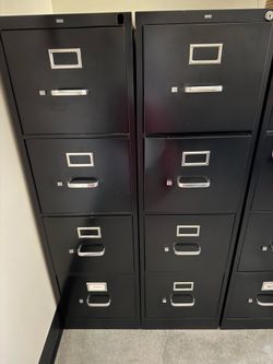 2 - 4 drawer tall black file cabinets