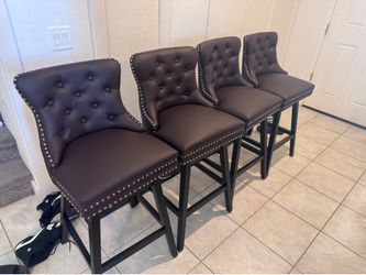Set of 4 Tufted Faux Leather Bar Stools with Nailhead Trim