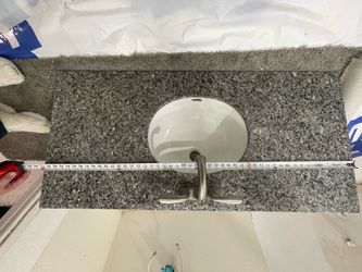 Sink with granite countertop