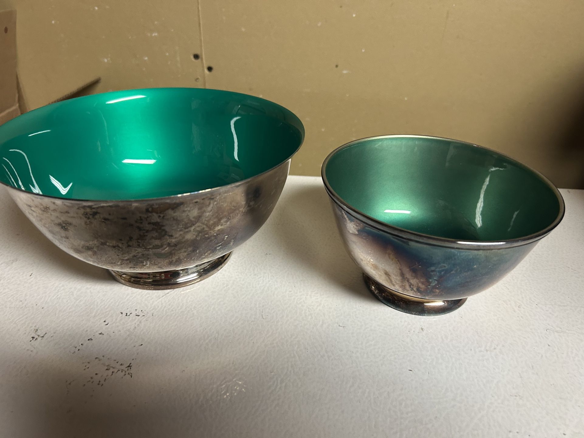 Silver plated bowl set with green enamel interior