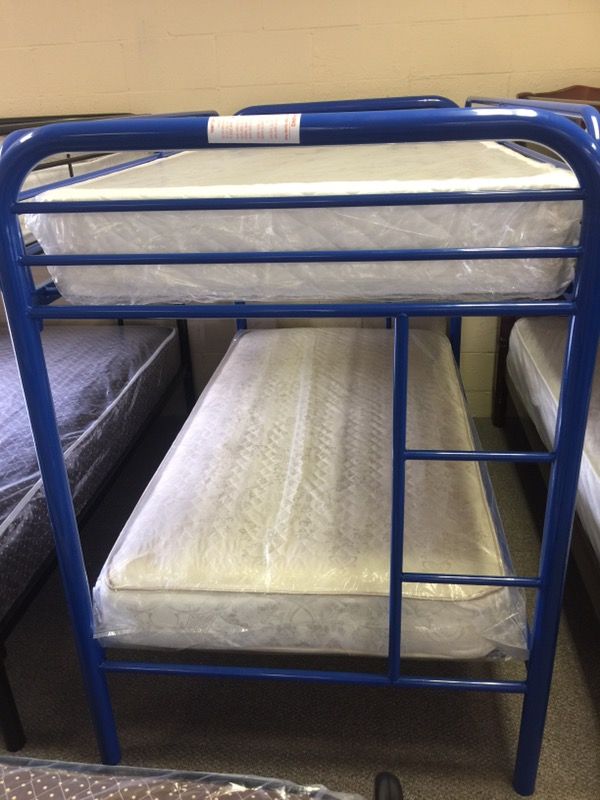 Twin bunk beds with mattresses