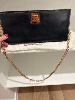 Ferragamo Black and Gold Purse with Red Interior
