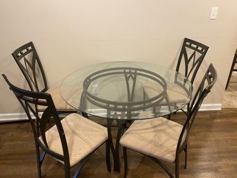 Glass table with 4 chairs