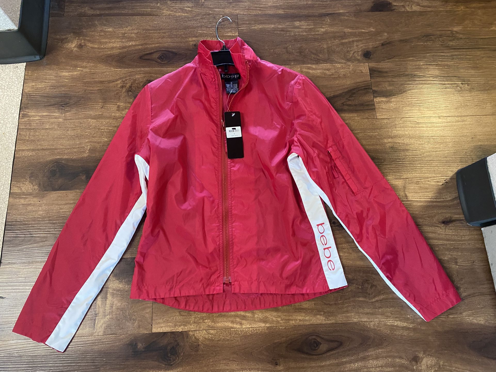 Brand new woman’s Bebe bbsp brand red activewear jacket up for sale