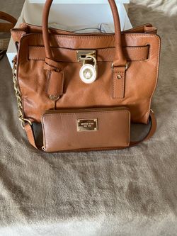 Michael Kors leather bag and matching wallet