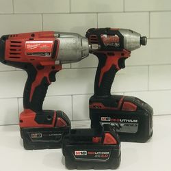 Milwaukee 1/2 wrench and impact  gun with 12.0 battery