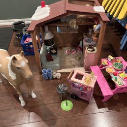 Our Generation Cozy Cabin Dollhouse With Doll And Extras