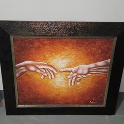 reproduction of Michelangelo's fresco, "The Creation of Adam.