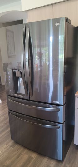 LG 4-Door Black Stainless Steel Refrigerator – $100 – NEEDS REPAIR