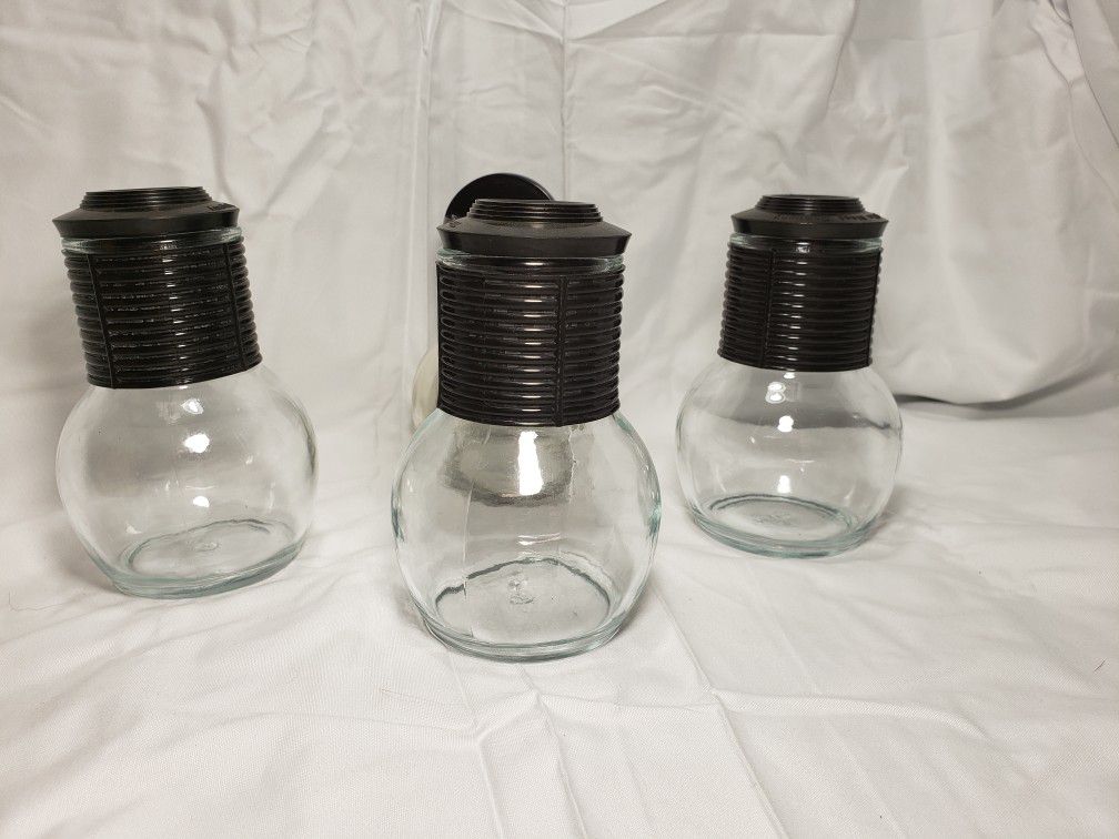 Vintage Jeanette glass carafes set of 4 with lids . These are from the 1950's or 60's .  They are made for hot beverages.  