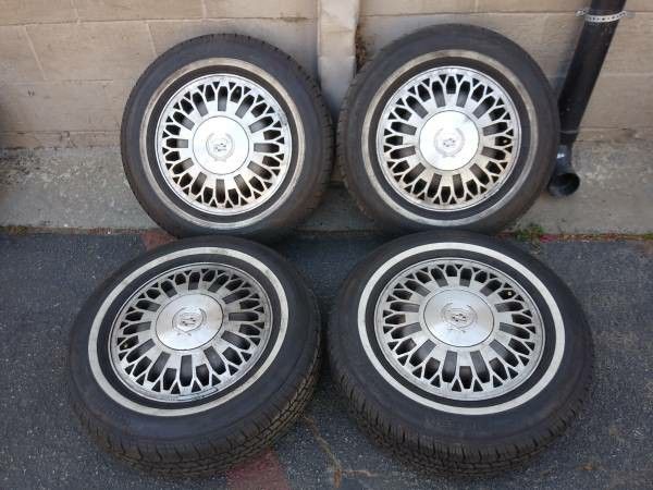 Cadillac 15 inch stock wheels and whitewalls 5 on 115mm Fits chevy