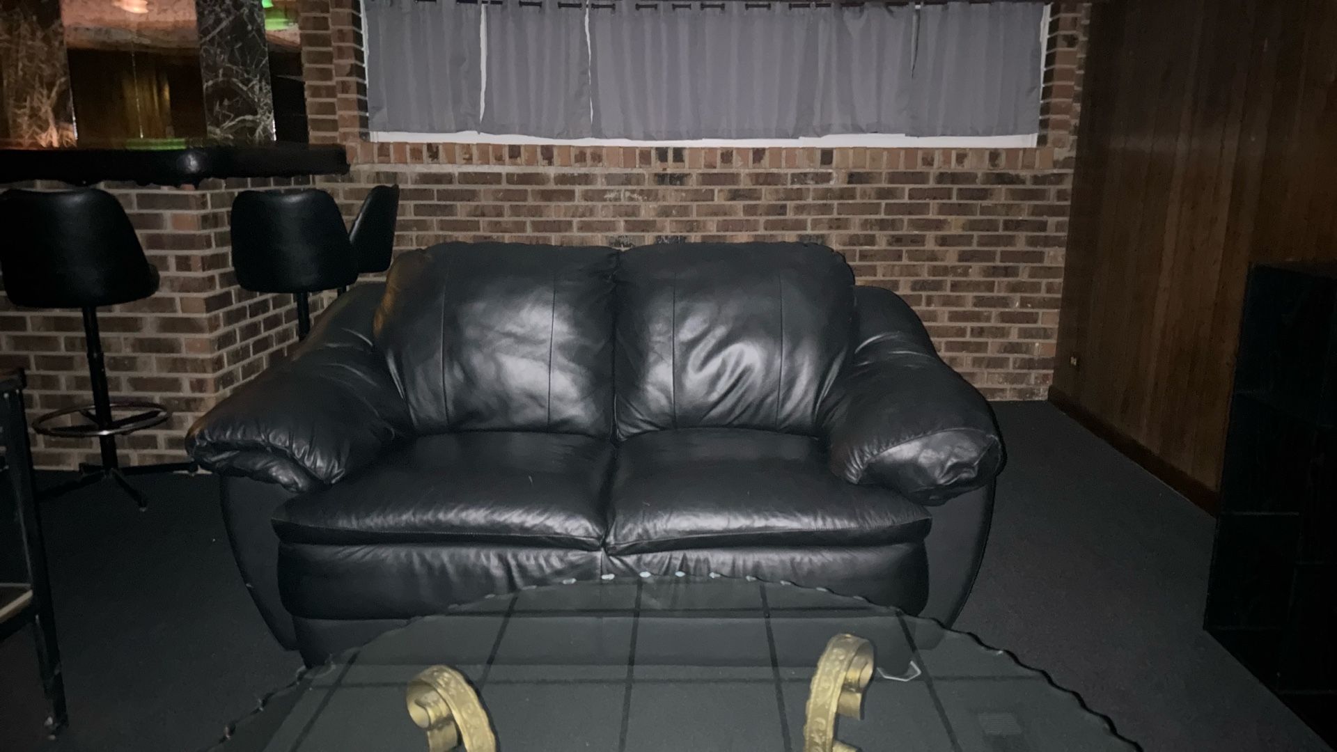 Leather Love Seat.