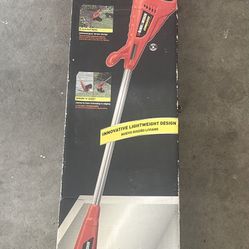 Black and Decker cordless trimmer with charger